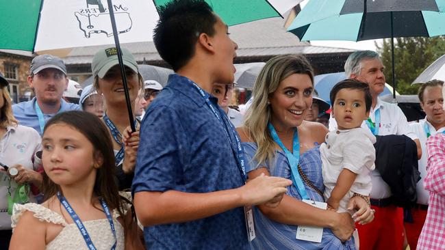 Ellie Day and her children on the 18th green. Picture: Mike Mulholland/Getty Images/AFP