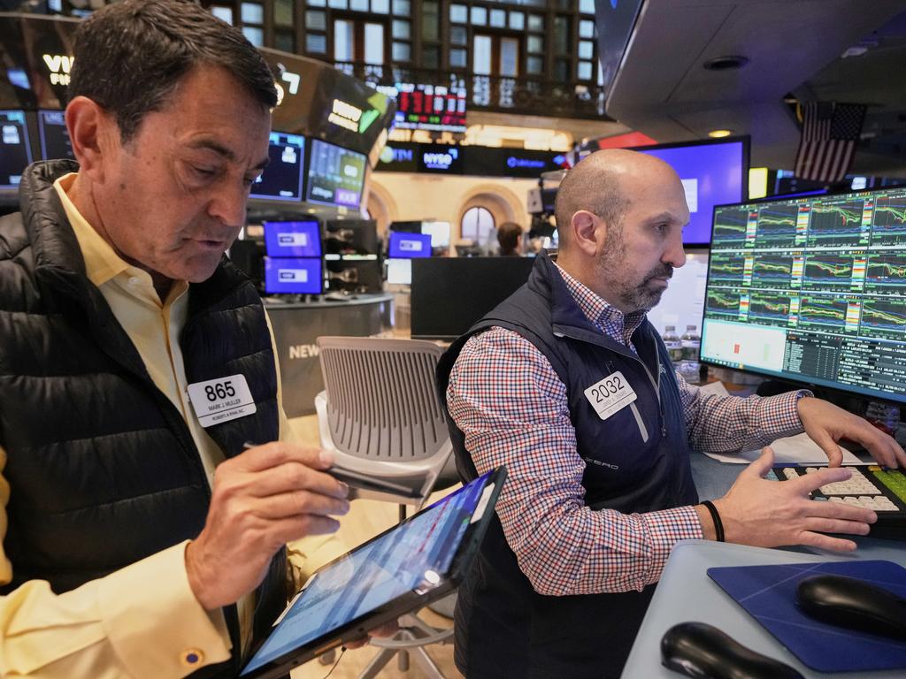 Traders at the New York Stock Exchange, which fell for the second straight day. Picture: AP