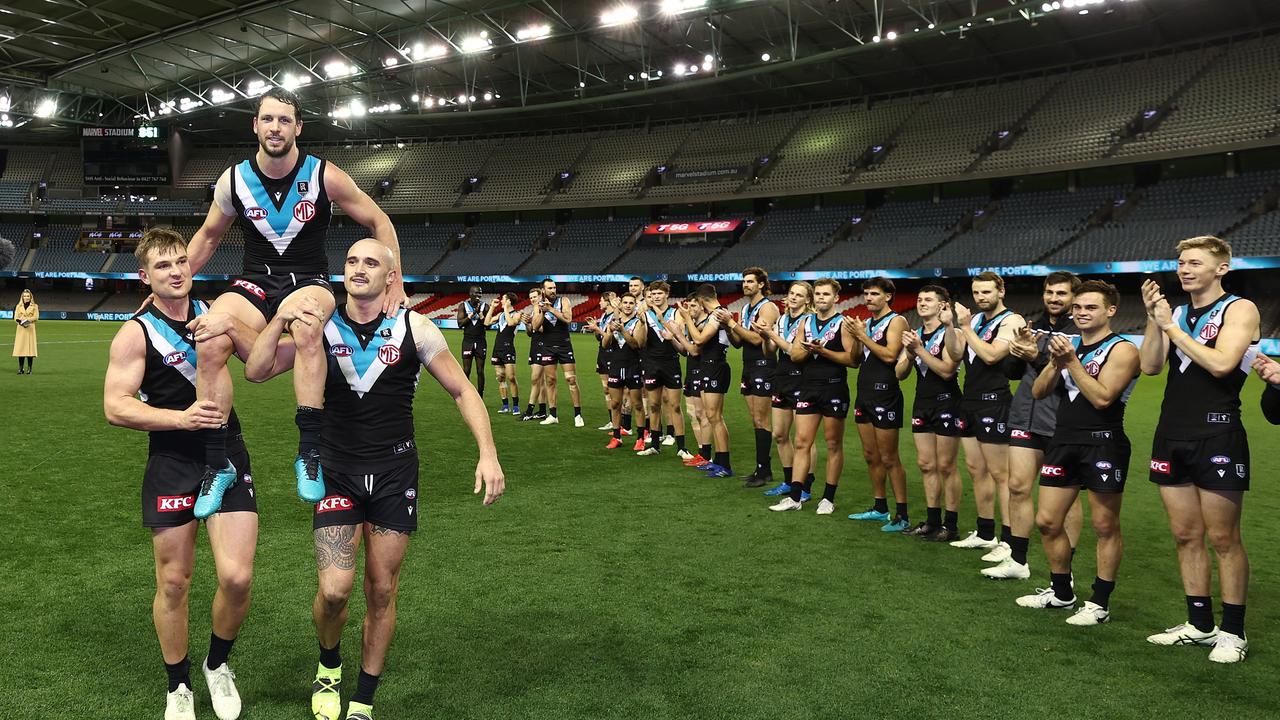 Travis Boak was given a guard of honour by both sides after his 300th game. Picture: Michael Klein