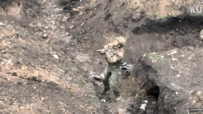 Drone footage shows Anitin using hand signals to communicate with the Ukrainian drone pilots. Picture: WSJ / Ukraine 92nd Mechanized Brigade