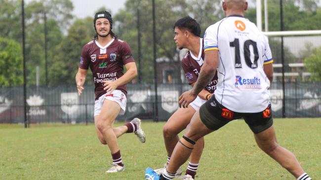 Bailey McConnell, pictured with headgear, has a killer running game when he comes onto the ball.