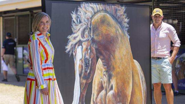 Magic Millions Ambassador and artist Nicole Slater with her husband Billy Slater. Picture: Jerad Williams