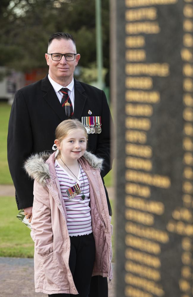 Rob Warrender and daughter Willow Warrender after Toowoomba's Anzac Day Dawn Service at the Mothers' Memorial, Thursday, April 25, 2024. Picture: Kevin Farmer