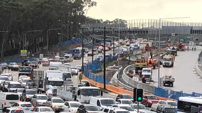 Heavy morning peak hour traffic on Warringah Rd, Frenchs Forest