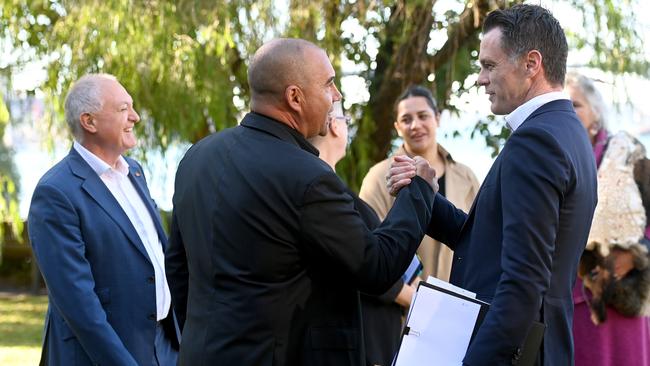 Nathan Moran, left, shakes hands with NSW Premier Chris Minns. Picture: Jeremy Piper