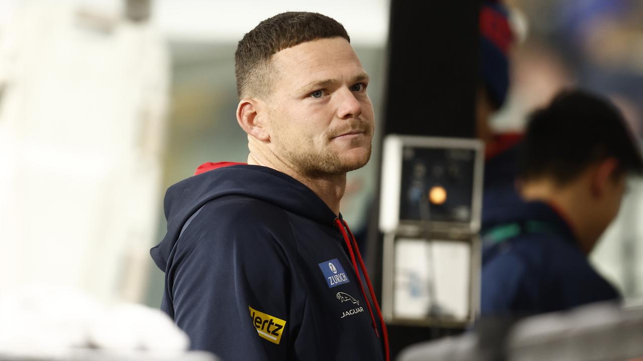 MELBOURNE, AUSTRALIA - MAY 28: Steven May of the Demons is seen on the interchange bench during the round 11 AFL match between the the Melbourne Demons and the Fremantle Dockers at Melbourne Cricket Ground on May 28, 2022 in Melbourne, Australia. (Photo by Darrian Traynor/Getty Images)