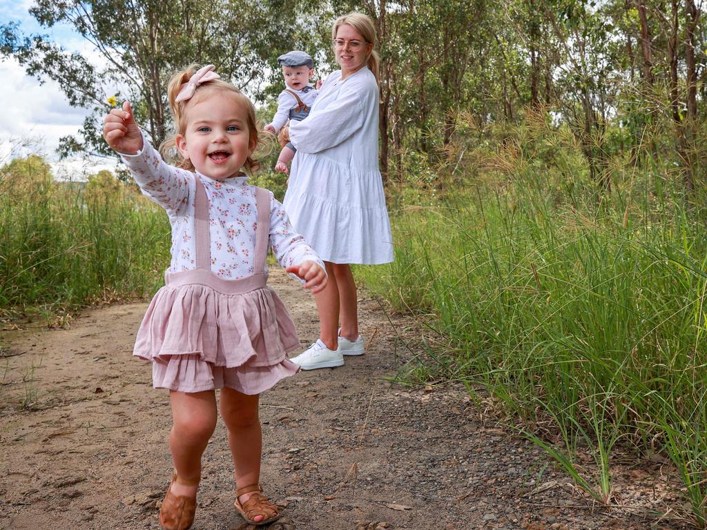 Mother Kelsey Boot, far right, with her children Olive, 2, and River Lewis, five months, wearing Best &amp; Less’ top-selling kids’ range. Picture: Justin Lloyd