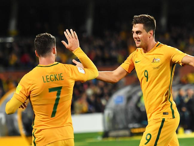 ADELAIDE, AUSTRALIA - JUNE 08: (L-R) Mathew Leckie and Jackson Irvine of Australia celebrate during the 2018 FIFA World Cup Qualifier match between the Australian Socceroos and Saudi Arabia at the Adelaide Oval on June 8, 2017 in Adelaide, Australia.  (Photo by Daniel Kalisz/Getty Images)