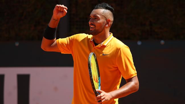 Nick Kyrgios celebrates winning a point against Casper Ruud at the Italian Open on Thursday. Kyrgios has been kicked out of the tournament. Picture: Getty Images