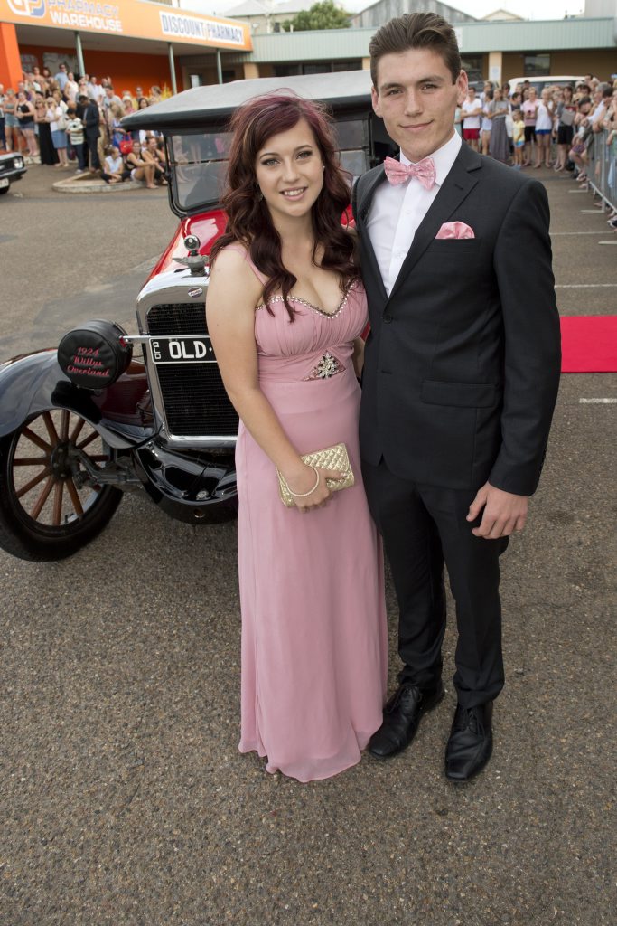 Claire Hamilton and Stuart McCallum arrive in a vintage 1924 Willys Overalnd. Picture: Kevin Farmer