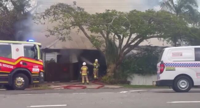 Watch: Two rushed to hospital after Queenslander engulfed in flames