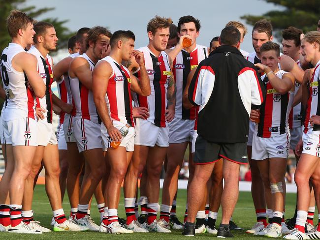 MORWELL, AUSTRALIA - MARCH 07: Saints coach, Alan Richardson speaks to his players after the NAB Challenge AFL match between the Essendon Bombers and the St Kilda Saints at the Morwell Recreation Reserve on March 7, 2015 in Morwell, Australia. (Photo by Robert Cianflone/Getty Images)