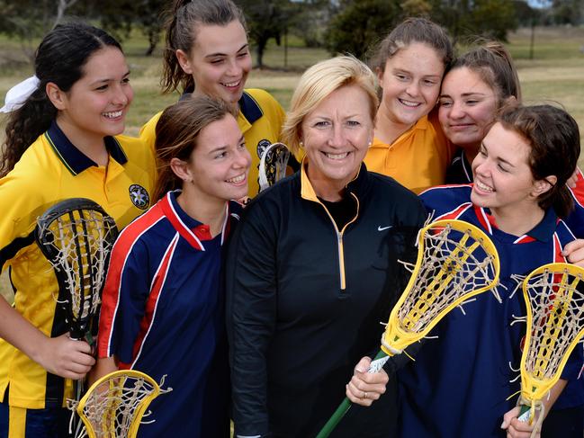 Sue with students she coached from Mt St Joseph’s Girls College Altona and Star of the Sea in Brighton. Picture: Kylie Else