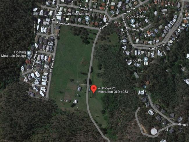 Aerial view of the partially-cleared property, which is surrounded by bush.