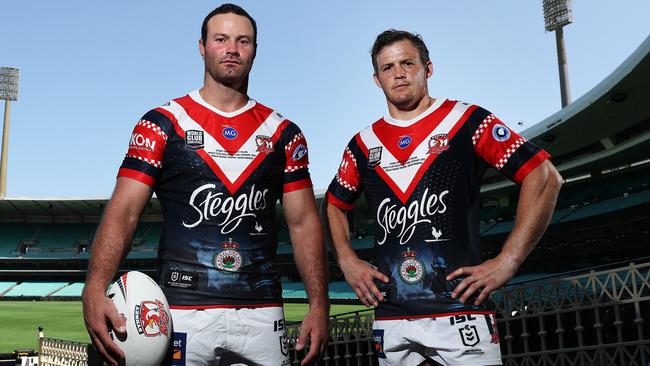 Boyd Cordner and Brett Morris with the Roosters’ World Club Challenge jersey. Photo: Brett Costello