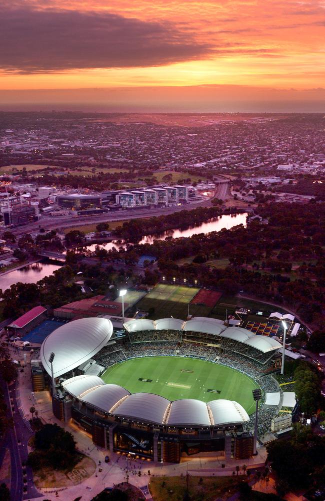 The sun sets over Adelaide on the evening of the first day-night Test match at Adelaide Oval. Picture: Naomi Jellicoe