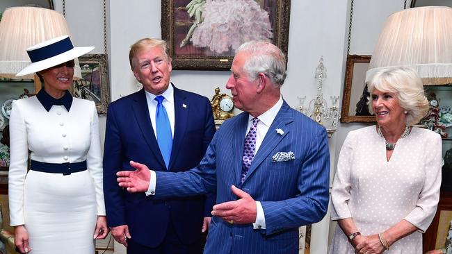 Melania, Trump, left, and Donald Trump with Prince Charles and Camilla at Clarence House. Picture: AFP.