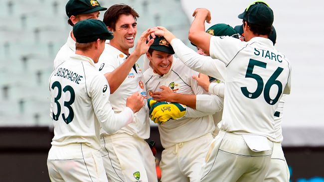 Pat Cummins celebrates the wicket of Cheteshwar Pujara after a brilliant catch by Tim Paine.