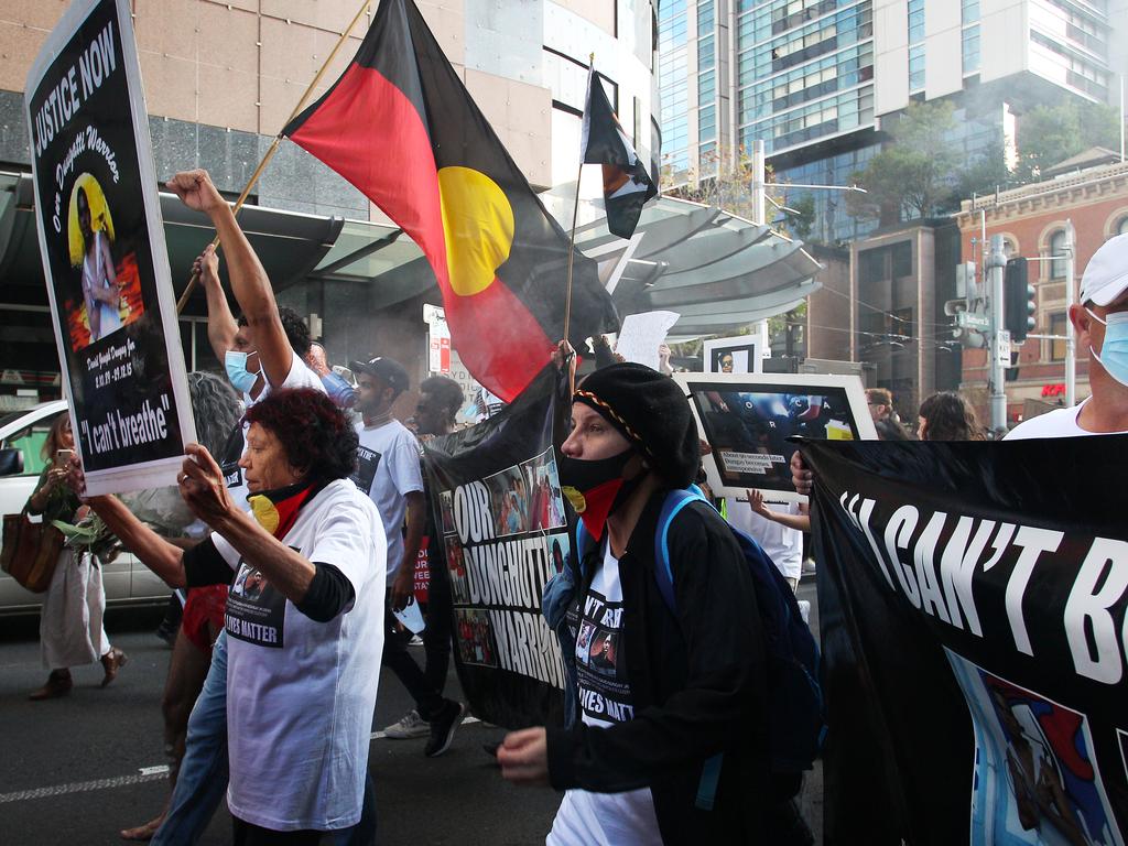 Leetona Dungay, left, whose son David Dungay Jr died in Sydney's Long Bay jail in 2015, takes part in the Black Lives Matter last weekend in Sydney. Picture: Lisa Maree Williams/Getty Images