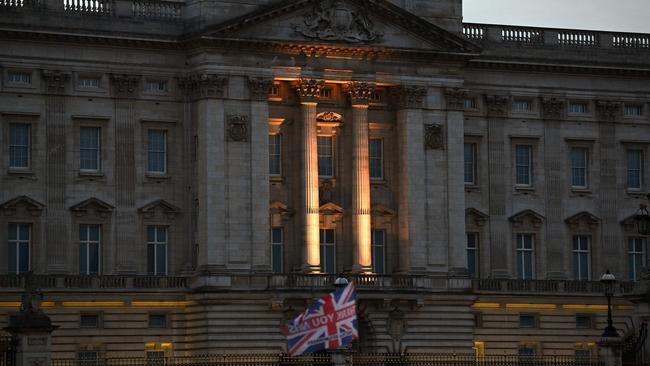 Buckingham Palace, the official residence of Queen Elizabeth II, in London at dusk. Picture: AFP