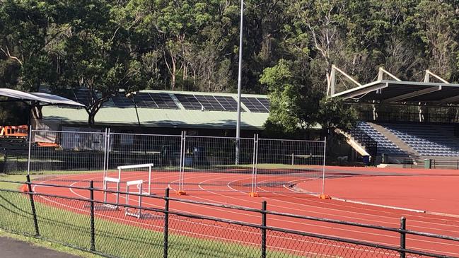 Barriers set up on the athletics track at the Sydney Academy of Sport on Thursday. Picture: Jim O’Rourke