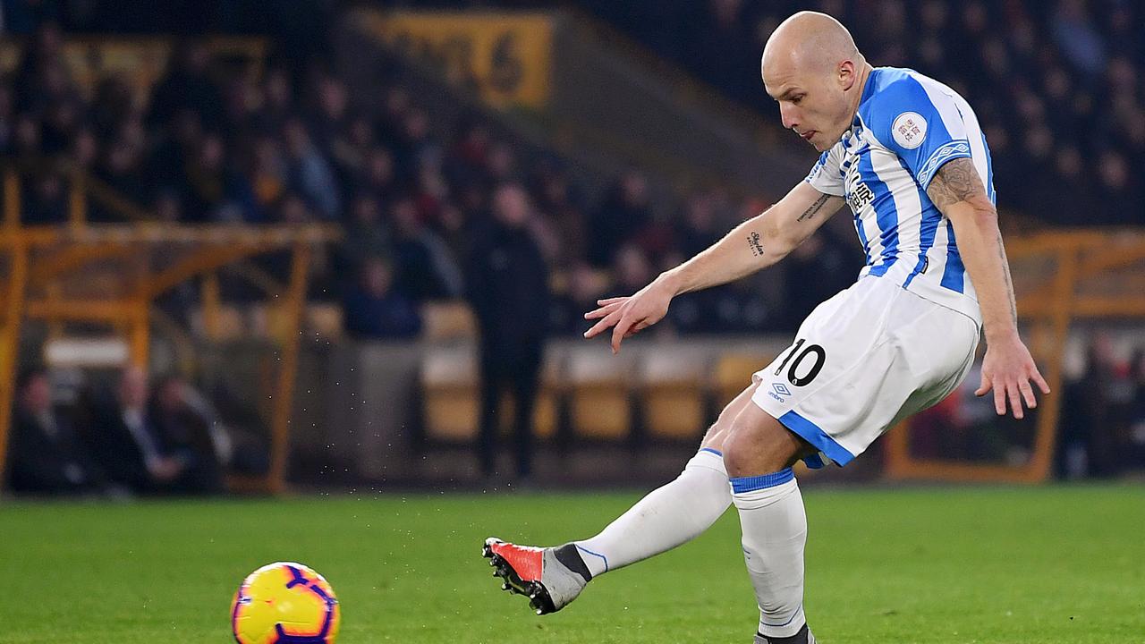 Aaron Mooy of Huddersfield scores his team's first goal