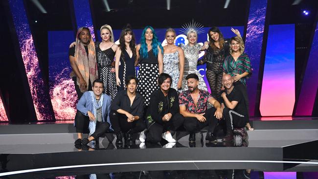 (Back left to right) Zaachariaha Fielding, Courtney Act, Leea Nanos, Amy Sheppard, Emma Sheppard, Kate Miller-Heidke, Ella Hooper, Tania Doko and (front left to right) Mark Vincent, Aydan Calafiore, Alfie Arcuri and Michael Ross are seen posing for a photograph during a media call at the Gold Coast Convention and Exhibition Centre on the Gold Coast, Friday, February 8, 2019. Ten artists are performing an original composition at the Eurovision - Australia Decides for their chance to represent Australia at the Eurovision Song Contest 2019. AAP Image/Darren England