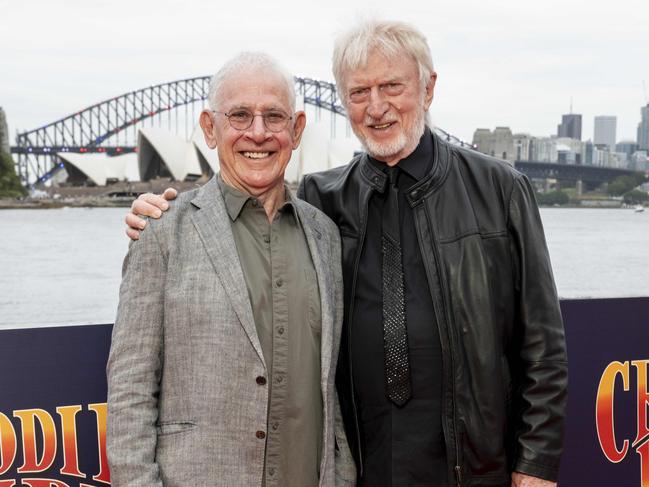 Crocodile Dundee Director Peter Faiman (L) poses for a photo on the red carpet at the ‘encore cut’ premiere. Picture: NewsWire / Monique Harmer