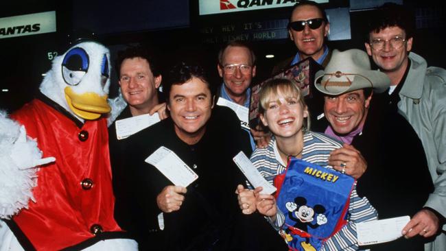 'Hey Hey It's Saturday' presenter Daryl Somers (C) with (LtoR) Plucka Duck, Russell Gilbert, John Blackman, singer Jo Beth Taylor, music commentator Ian 'Molly' Meldrum, musicians Red Symons and Wilbur Wilde (back R) in 1995.