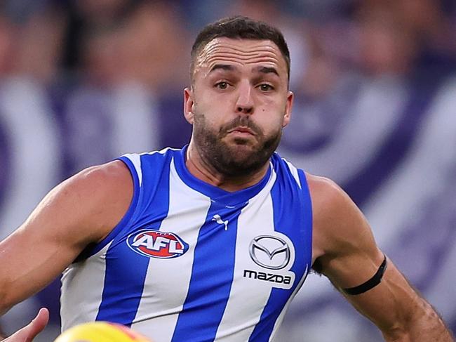 PERTH, AUSTRALIA - MARCH 25: Griffin Logue of the Kangaroos in action during the round 2 AFL match between the Fremantle Dockers and North Melbourne Kangaroos at Optus Stadium, on March 25, 2023, in Perth, Australia. (Photo by Paul Kane/Getty Images)