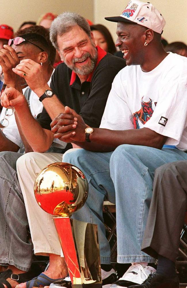 MJ right, with then-Bulls coach Phil Jackson. Picture: AFP