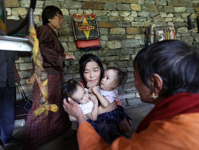 When they finally do brave the public to offer prayers at the Bhutan Memorial Chorten, the relief is obvious. Picture: Alex Coppel