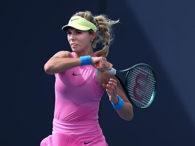 MIAMI GARDENS, FLORIDA - MARCH 25: Katie Boulter of Great Britain returns a shot against Victoria Azarenka during their match on Day 10 of the Miami Open at Hard Rock Stadium on March 25, 2024 in Miami Gardens, Florida. (Photo by Al Bello/Getty Images)