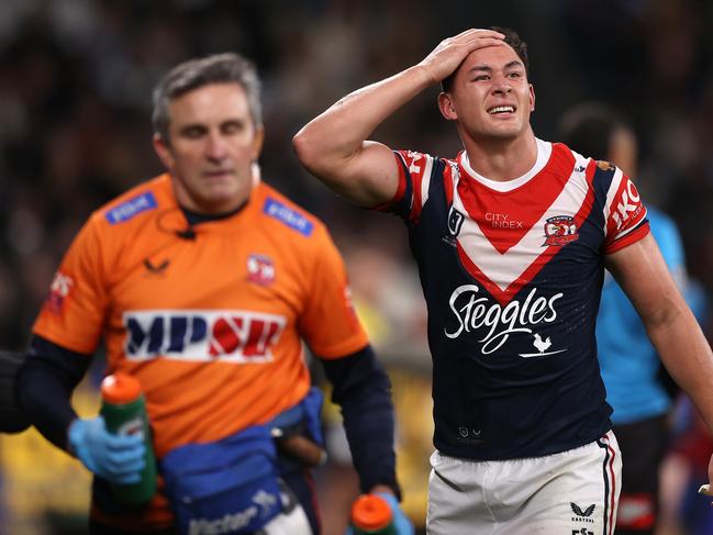 SYDNEY, AUSTRALIA - SEPTEMBER 02:  Joseph Manu of the Roosters reacts after a calf injury during the round 25 NRL match between the Sydney Roosters and the South Sydney Rabbitohs at Allianz Stadium on September 02, 2022, in Sydney, Australia. (Photo by Mark Kolbe/Getty Images)