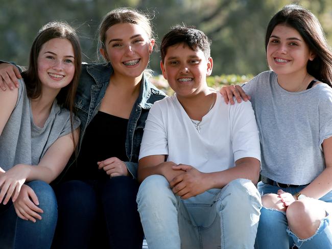 Teenagers Veronica Williams, Gigi Dooley, Zachary Braithwaite and Estrella Vega are happy to wear braces. Picture: Toby Zerna