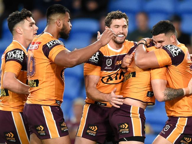 GOLD COAST, AUSTRALIA - SEPTEMBER 12: Darius Boyd of the Broncos celebrates scoring a try with team mates during the round 18 NRL match between the Gold Coast Titans and the Brisbane Broncos at Cbus Super Stadium on September 12, 2020 in Gold Coast, Australia. (Photo by Matt Roberts/Getty Images)