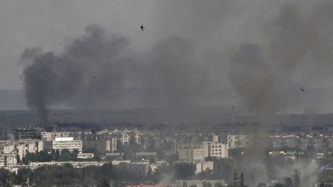 Smoke and dirt rise from the city of Severodonetsk in the eastern Ukrainian region of Donbas. Picture: Aris Messinis/AFP