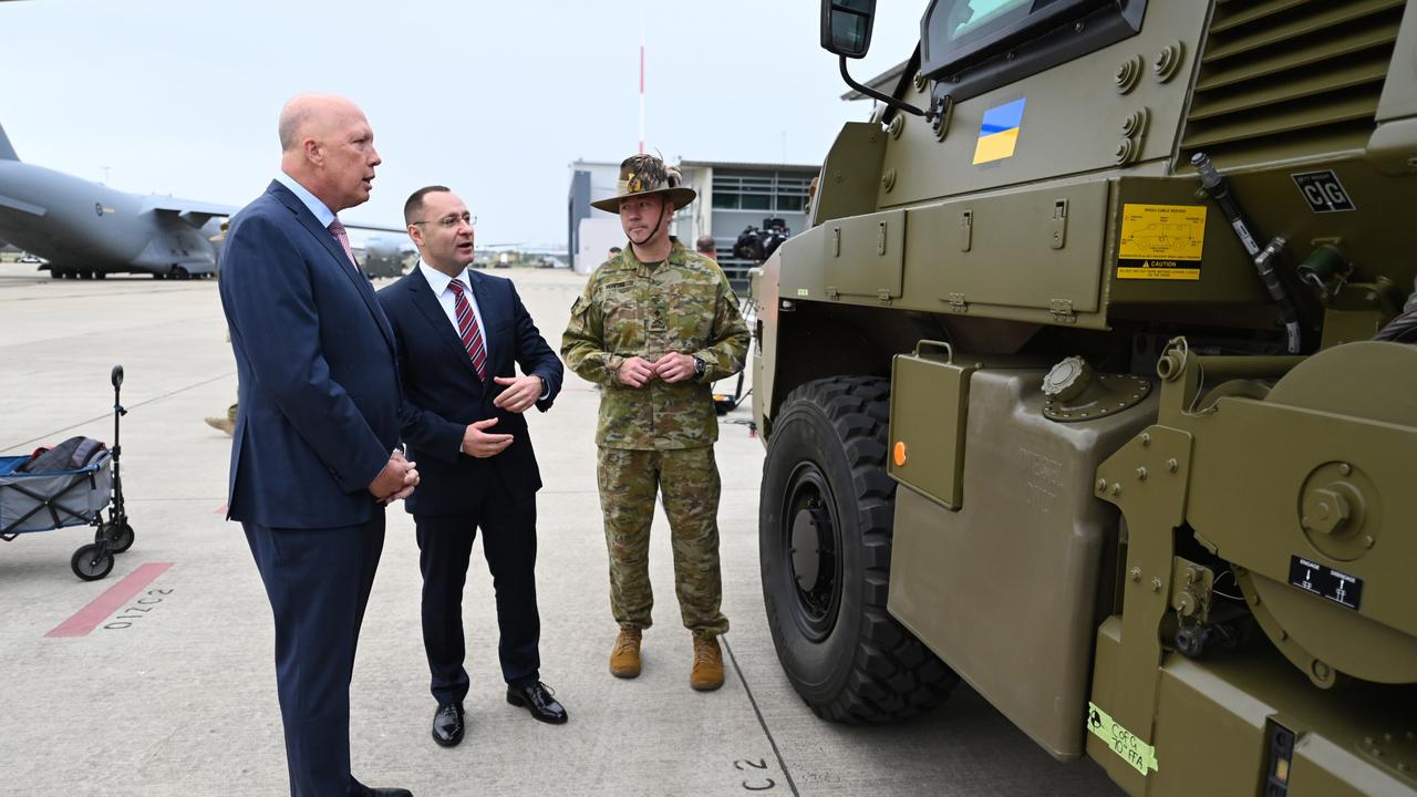 Ambassador of Ukraine to Australia Vasyl Myroshnychenko was with Defence Minister Peter Dutton as the vehicles left. Picture: Dan Peled/Getty Images
