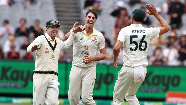 Pat Cummins, Mitch Starc and Travis Head enjoy Khaya Zondo’s run out. Picture by Michael Klein