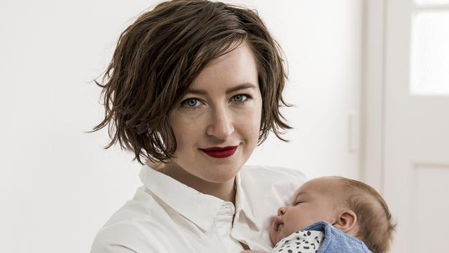 Washington with son Amos who was born in 2018. Picture: Mark Cranitch