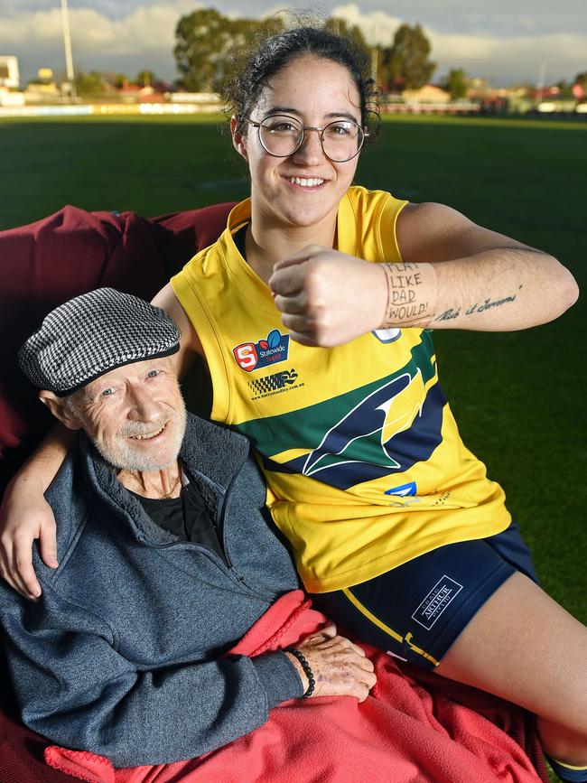 Eagles SANFLW player Teagan Usher with her father John Usher. Teagan pays tribute to her ‘miracle man’ father by writing ‘play like dad would’ on wrist tape for every football game. Picture: Tom Huntley