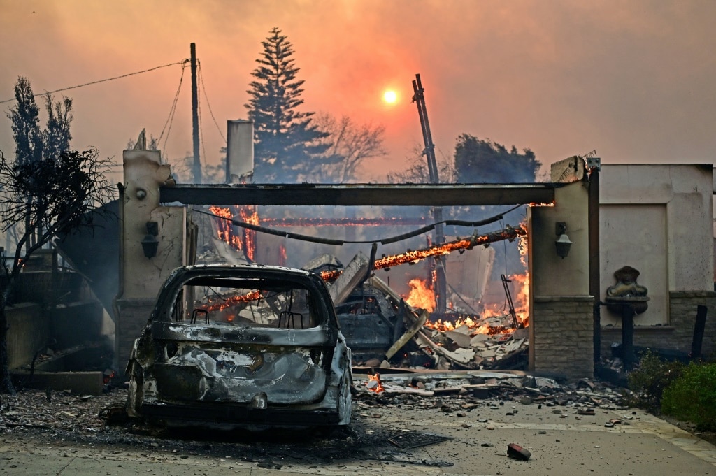 Whole streets burn as fires rage around Los Angeles