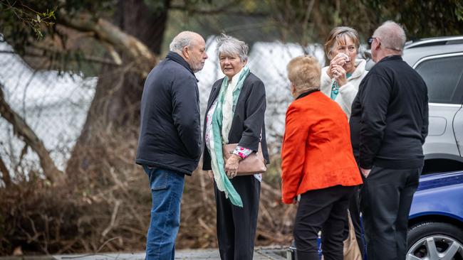 Mourners at the memorial service of Don and Gail Patterson.