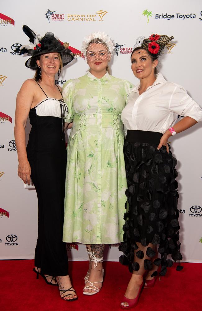 Jo Thompson, Ange Hennessy and Nicki Smith at the 2024 Darwin Cup Carnival Ladies Day. Picture: Pema Tamang Pakhrin