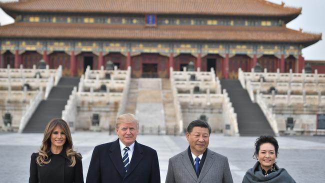 First Lady Melania Trump, joined her husband in meeting Mr Xi and his wife Peng Liyuan last year. Picture: Jim Watson/AFP