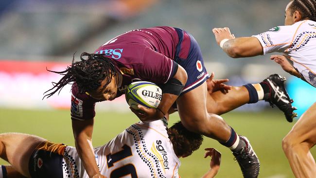 The Reds’ Brandon Paenga-Amosa is tackled during his side’s loss to the Brumbies. Picture: Mark Nolan/Getty Images