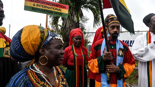 Members of Ethiopia Africa Black International Congress Church protest the visit of Prince Williams and Catherine the Duchess of Cambridge. Picture: AFP.