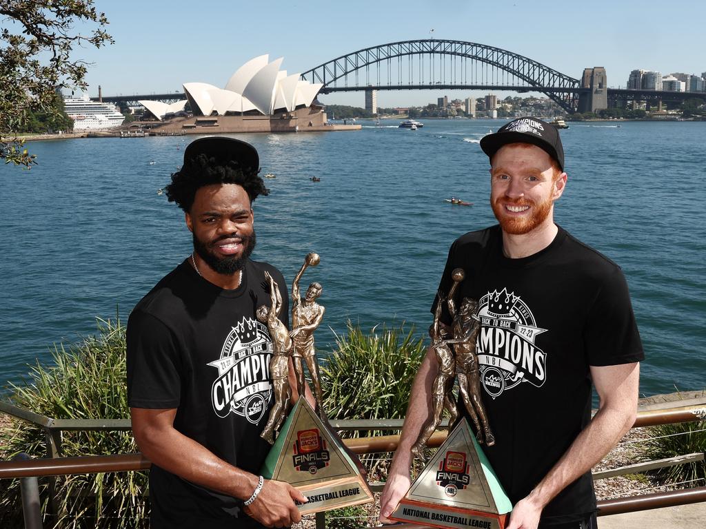 Derrick Walton Jr (left) and Angus Glover with their 2022 and 2023 NBL Championship trophies. Picture: King/Getty Images