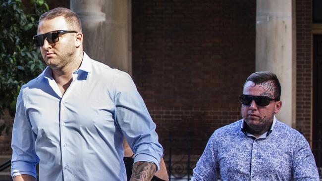 Finks members Benjamin Main (right) and Mitchell Cole arrive at the NSW Supreme Court to fight a police bid to impose serious crime prevention orders on them.