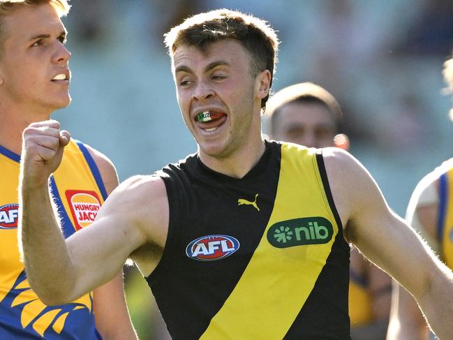 MELBOURNE, AUSTRALIA - MAY 11: Tom Brown of the Tigers celebrates kicking a goal during the round nine AFL match between Richmond Tigers and West Coast Eagles at Melbourne Cricket Ground, on May 11, 2025, in Melbourne, Australia. (Photo by Quinn Rooney/Getty Images)